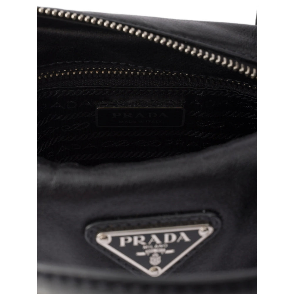 Prada top-handle handbag in black calf leather — styling view | La Parisienne Qatar