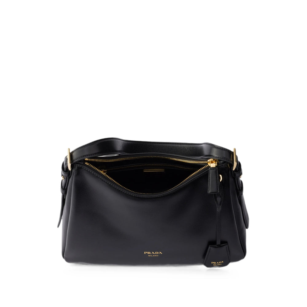 Prada shoulder bag in black calf leather — side profile | La Parisienne Qatar