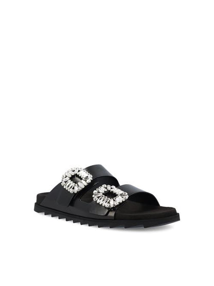Roger Vivier leather flats in black calfskin — rear view | La Parisienne Qatar