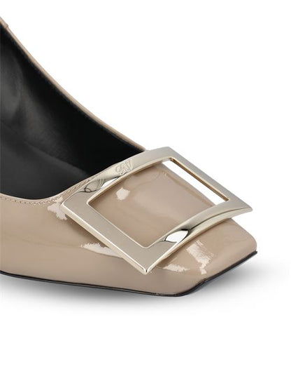 Roger Vivier Trompette pumps in beige patent leather — side profile | La Parisienne Qatar