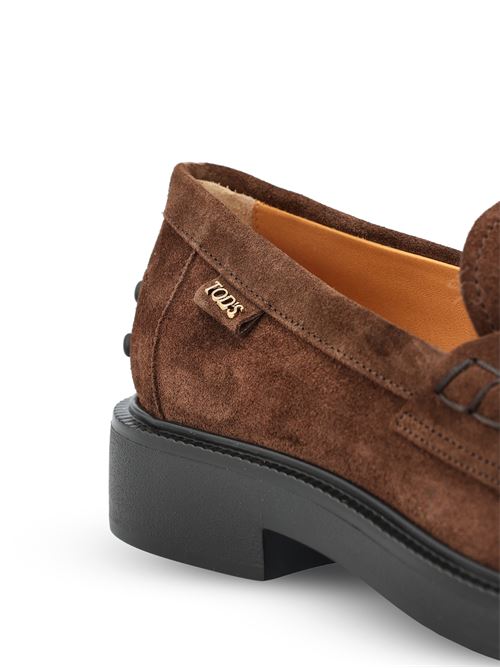 Tod's Gommino driving shoes in brown suede — side profile | La Parisienne Qatar