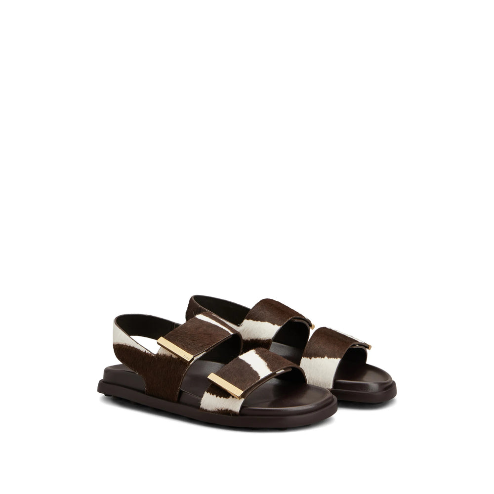Tod's leather loafers in brown calfskin — rear view | La Parisienne Qatar