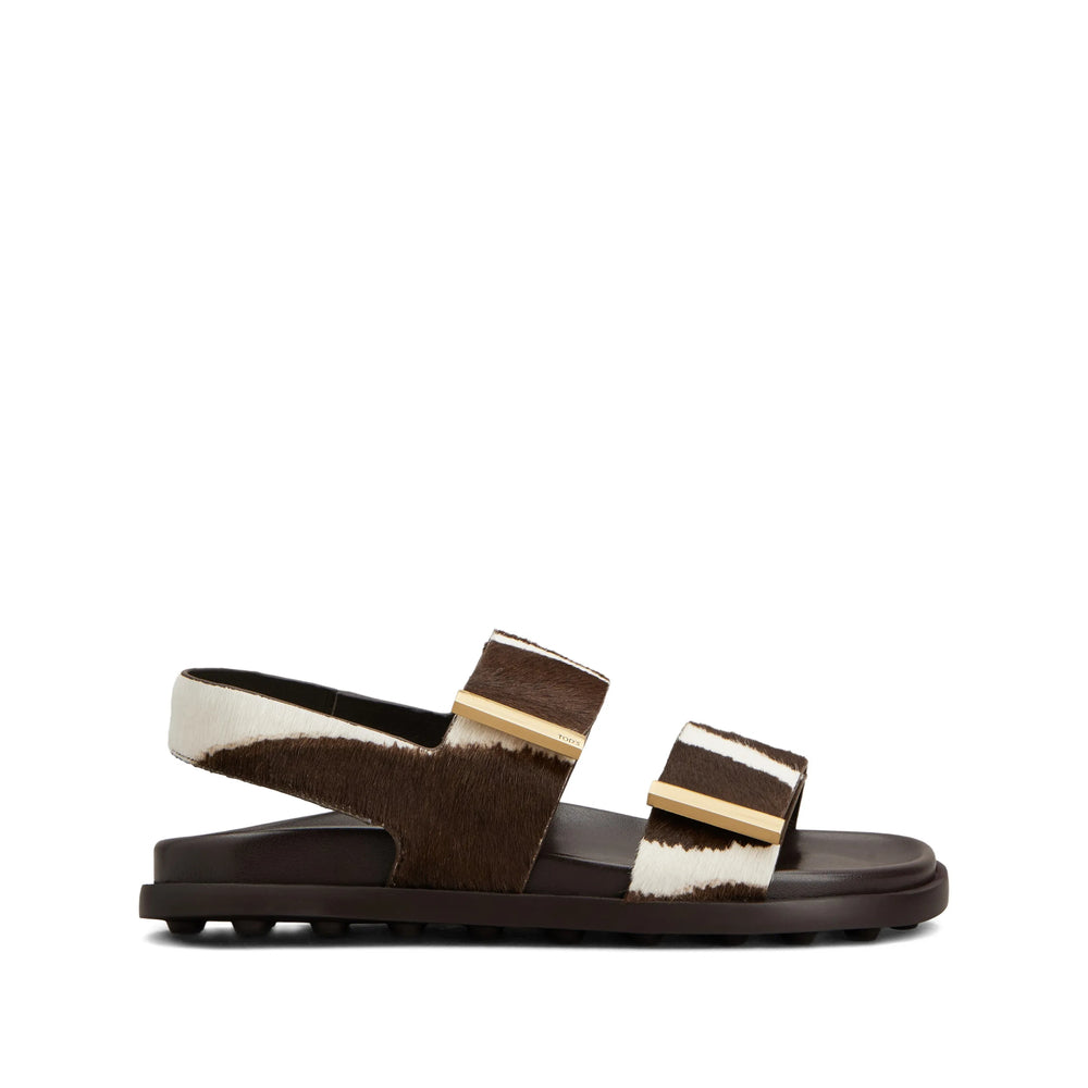 Tod's leather loafers in brown calfskin — front view | La Parisienne Qatar