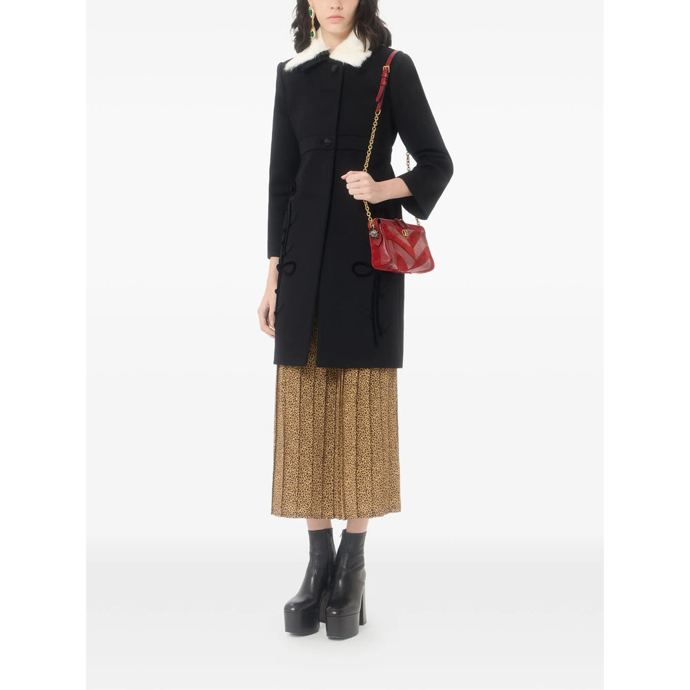 Valentino Garavani bag in red calf leather and suede — side profile | La Parisienne Qatar