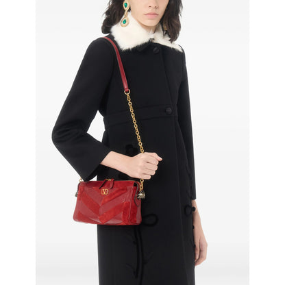 Valentino Garavani bag in red calf leather and suede — alternate angle | La Parisienne Qatar