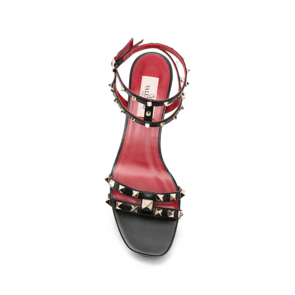 Valentino Garavani leather pumps in black calfskin — side profile | La Parisienne Qatar