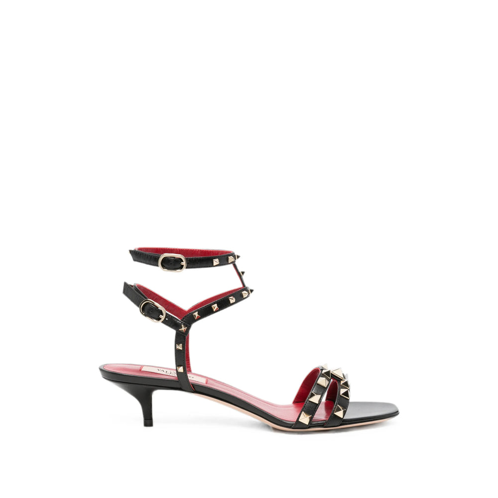 Valentino Garavani leather pumps in black calfskin — front view | La Parisienne Qatar