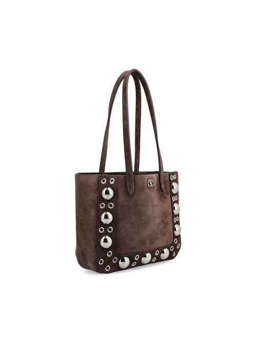 Valentino Garavani Nellcôte mini tote in brown suede — detail view | La Parisienne Qatar