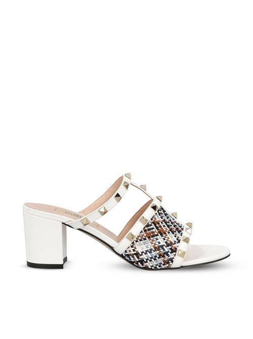 Valentino Garavani Rockstud sandals in white — front view | La Parisienne Qatar