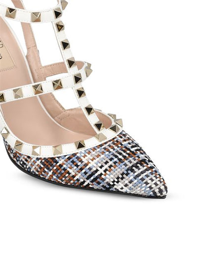 Valentino Garavani Rockstud slingback pumps in white — side profile | La Parisienne Qatar