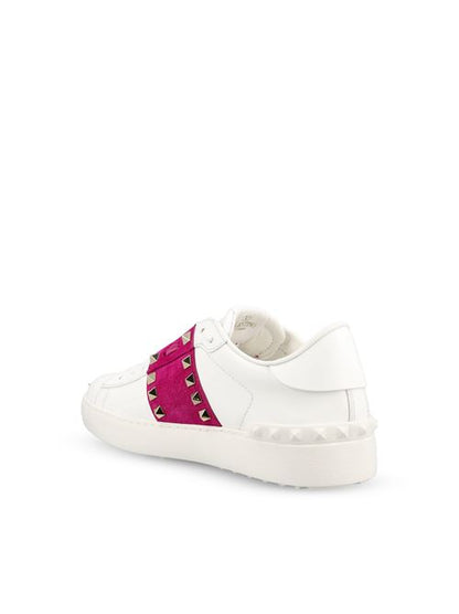 Valentino Garavani Rockstud Untitled sneakers in white and pink — detail view | La Parisienne Qatar