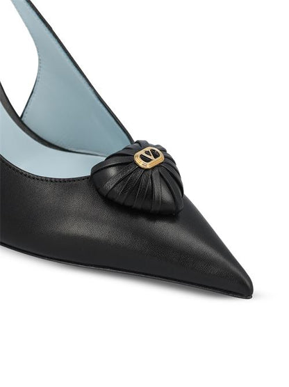 Valentino Garavani Royal Coeur slingback pumps in black — side profile | La Parisienne Qatar