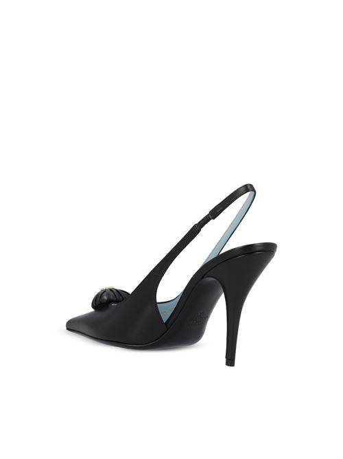 Valentino Garavani Royal Coeur slingback pumps in black — detail view | La Parisienne Qatar