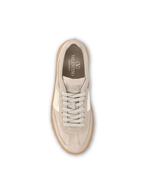 Valentino Garavani Upvillage sneakers in beige suede — side profile | La Parisienne Qatar