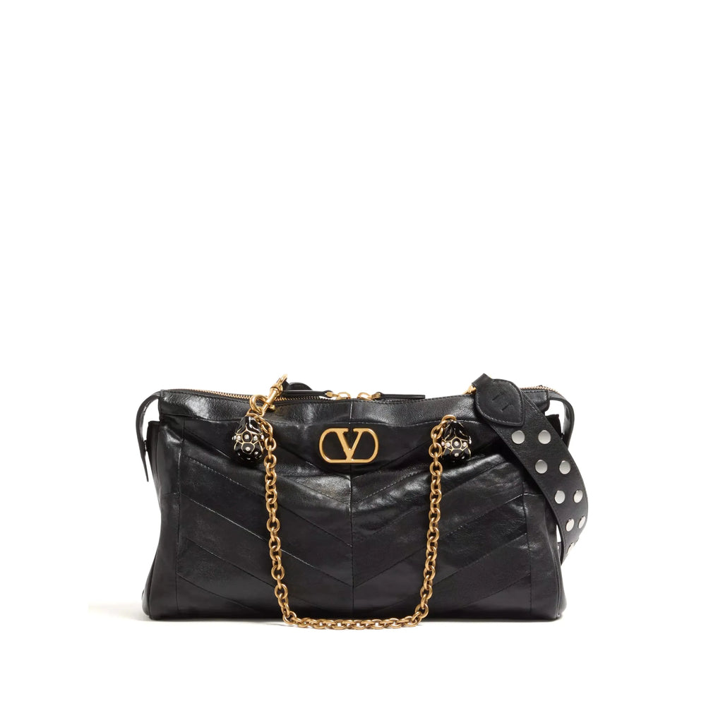 Valentino Garavani VLogo Signature shoulder bag in black — front view | La Parisienne Qatar