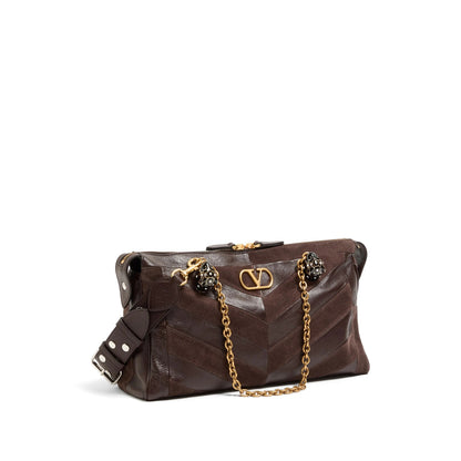 Valentino Garavani VLogo Signature shoulder bag in brown — alternate angle | La Parisienne Qatar